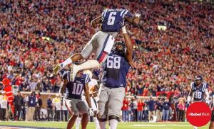 One of Jaylen Walton's touchdowns against Tennessee in 2014 is celebrated with a lift in the air from Justin Bell. (Photo credit: Bentley Breland, The Rebel Walk)