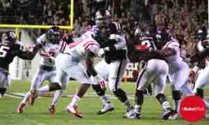 Rebels stop Aggie RB Tra Carson