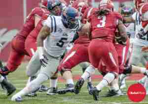 Nkemdiche with eyes set on Razorback RB Collins in the 2014 Arkansas game. (Photo credit: Bentley Breland, The Rebel Walk)