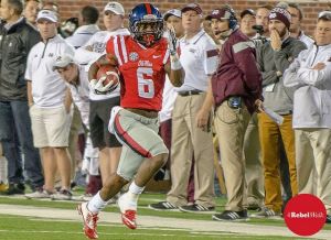 Jaylen Walton races for a 91-yard touchdown run against the Bulldogs in the 2014 Ole Miss Egg Bowl win over State. (Photo credit: Bentley Breland, The Rebel Walk)
