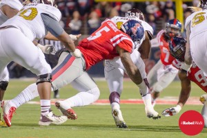 Robert Nkemdiche brings down Mississippi State running back Josh Robinson in the 2014 Egg Bowl. (Photo credit: Bentley Breland, The Rebel Walk)