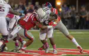 DeMarquis Gates makes a tackle during the win over A&M this season. (Photo credit; Bentley Breland, The Rebel Walk)