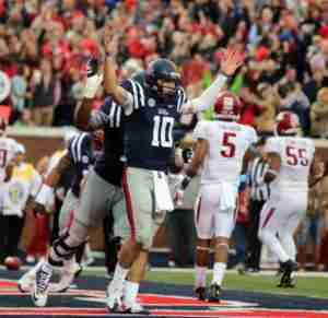 Chad Kelly scored three TDs rushing and threw for 3 more. (Photo credit: Joshua McCoy, Ole Miss Athletics)