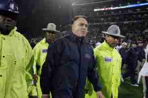 Former Ole Miss head coach Houston Nutt leaves Davis Wade after the Rebels lost to MSU, 31-3 in the 2011 Egg Bowl.