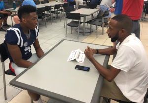 DaMarkus Lodge speaks with The Rebel Walk's Courtney Smith at Monday's Media Day. (Photo credit: Evelyn Vanpelt, The Rebel Walk)