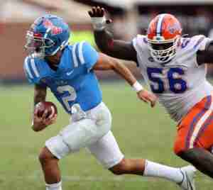 Matt Corral runs for yards against Florida.