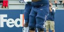 Jaylen Walton and Justin Bell celebrate