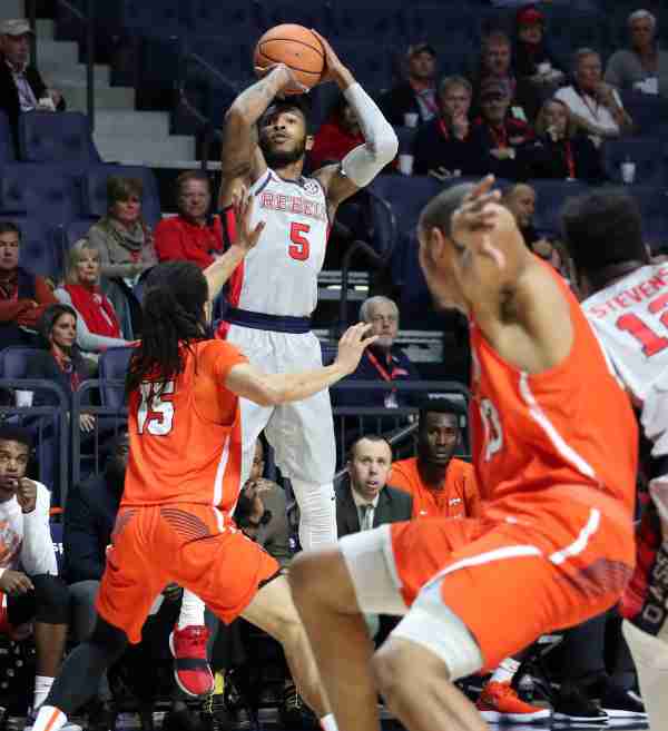 Rebels use strong showing on offense to defeat Sam Houston State, 82-69