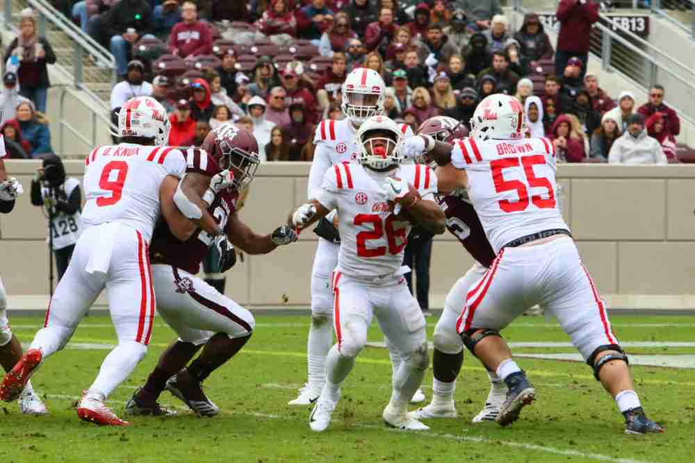 Rebels fall on the road in 38-24 loss to Aggies