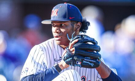 Ole Miss pitcher Austin Simmons leaves game one vs. Alabama with apparent elbow injury